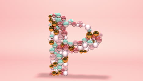 Letter-P-made-of-beads,-glass-balls,-pastel-pearls,-crystal-jewels-and-gold